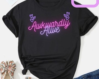 Glow Awkwardly Alive PNG  |  Sublimation PNG, Antisocial PNG, Introvert png, small business png, sarcastic png, awkward png, I hate it here