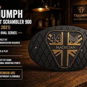 Może przedstawiać: Czarna, owalna osłona boczna do Triumph Street Scrambler 900 (po 2021) ze złotymi akcentami. Zawiera napis "44 MAGISCIAN" i wz&oacute;r Union Jack. Część serii Oval, wykonana z wysokiej jakości ABS.