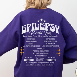 Epilepsie-Bewusstseins-Sweatshirt Anfall Tour Band Niedliches lustiges Pullover Geschenk für Epileptische Rundhalsausschnitt Anfallsleiden Lila Band Monat Bekleidung