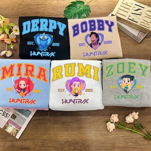 Huntrix Band Shirt, Demon Hunters Merch, Gift for Kpop Fans, Demon Hunters Shirt, Mira, Rumi, Zoey Shirt, Derpy Tiger Tee,Kpop Huntrix Shirt