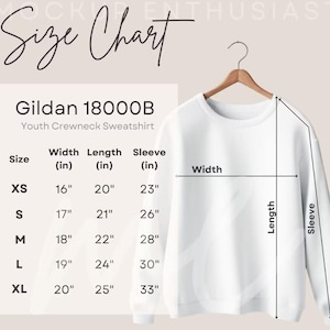 May include: Size chart for Gildan 18000B youth crewneck sweatshirts. The chart shows measurements in inches for width, length, and sleeve length for sizes XS, S, M, L, and XL.