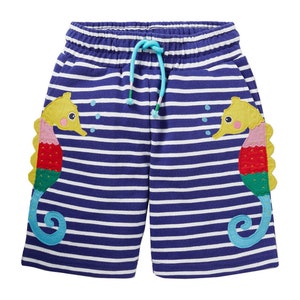 Mini Boden Jersey Applique Shorts in Blue Wave/Ivory Seahorse