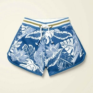 Mini Boden Girl's Sparkle Waist Jersey Shorts in Sky Blue Palm