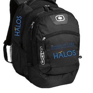 May include: Black backpack with multiple compartments and a mesh side pocket. The backpack features the text "HALOS" in blue, along with the "Angels of Care Pediatric Home Health" logo. The brand name "OGIO" is also visible.