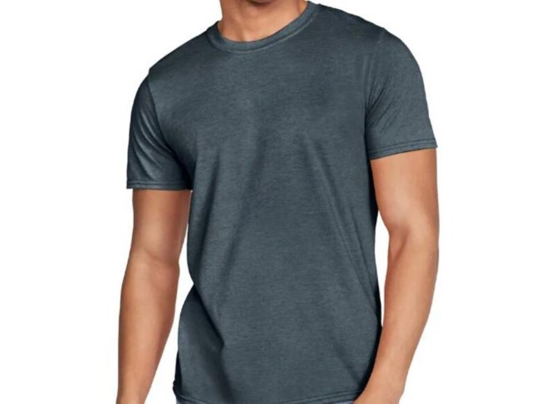 May include: A short-sleeved, crew neck t-shirt in a dark teal color. The shirt has a slightly textured appearance and a classic, casual style. The fabric appears to be a soft, breathable material.