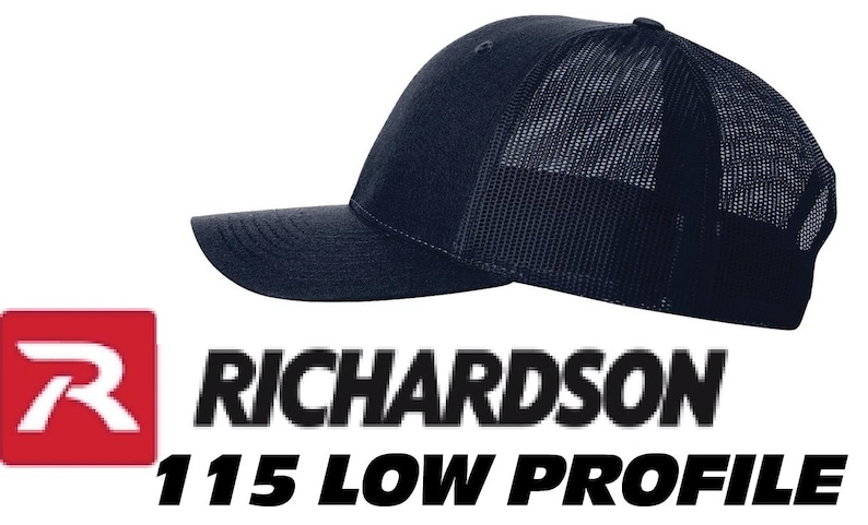May include: A solid navy blue baseball cap featuring a structured front panel and a breathable mesh back. The text RICHARDSON 115 LOW PROFILE is displayed below the cap, accompanied by a red square icon containing a white stylized letter R.