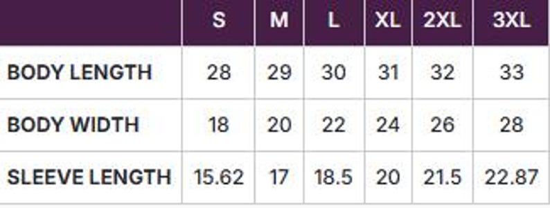 May include: A size chart with measurements for clothing. The chart includes sizes S, M, L, XL, 2XL, and 3XL. Measurements are provided for body length, body width, and sleeve length in inches. The chart has a purple header.