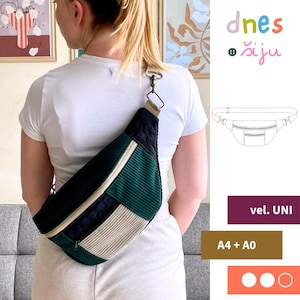 Può includere: Un marsupio in velluto a coste verde, nero e beige con chiusura a zip. La borsa è indossata a tracolla. La borsa ha il testo "dnes šiju" in alto a destra.
