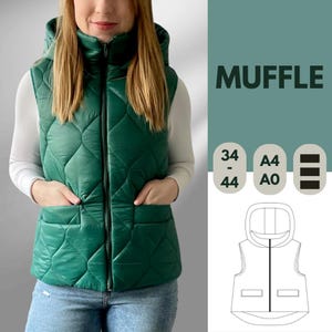 May include: Emerald green quilted vest with a hood and pockets. The vest has a diamond pattern and a full-length zip. The word "MUFFLE" is printed on the right side of the image, along with sizing information and a vest diagram.