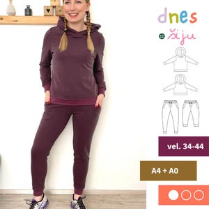 May include: A burgundy hooded sweatshirt and matching sweatpants set. The sweatshirt has a drawstring hood and ribbed cuffs and hem. The sweatpants have pockets. The image also includes the text "dnes šiju" and size information.