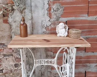 Side table created with an old Singer sewing machine.