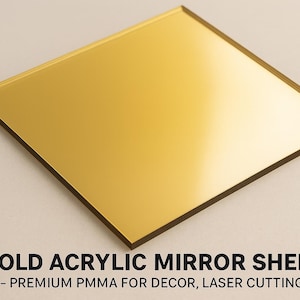 May include: A square gold acrylic mirror sheet. The sheet is 3 mm thick and has a reflective surface. The text on the image reads "GOLD ACRYLIC MIRROR SHEET" and "3 mm - PREMIUM PMMA FOR DECOR, LASER CUTTING & DIY."