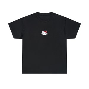 May include: Black t-shirt with a white Hello Kitty embroidered on the front.