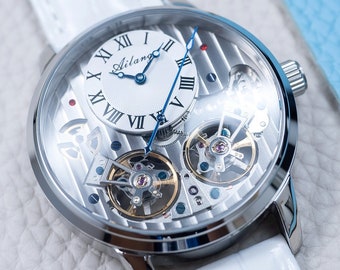 Orologio automatico inciso: doppio volano, vetro zaffiro, pelle bianca