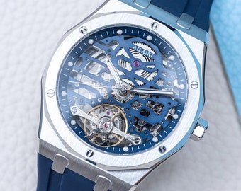 Automatic Skeleton Watch: Silver Stainless Steel with Blue Rubber Strap