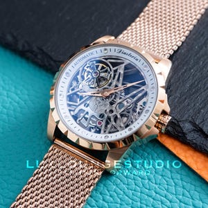 Mens Rose Gold Skeleton Watch: Automatic Mechanical Timepiece