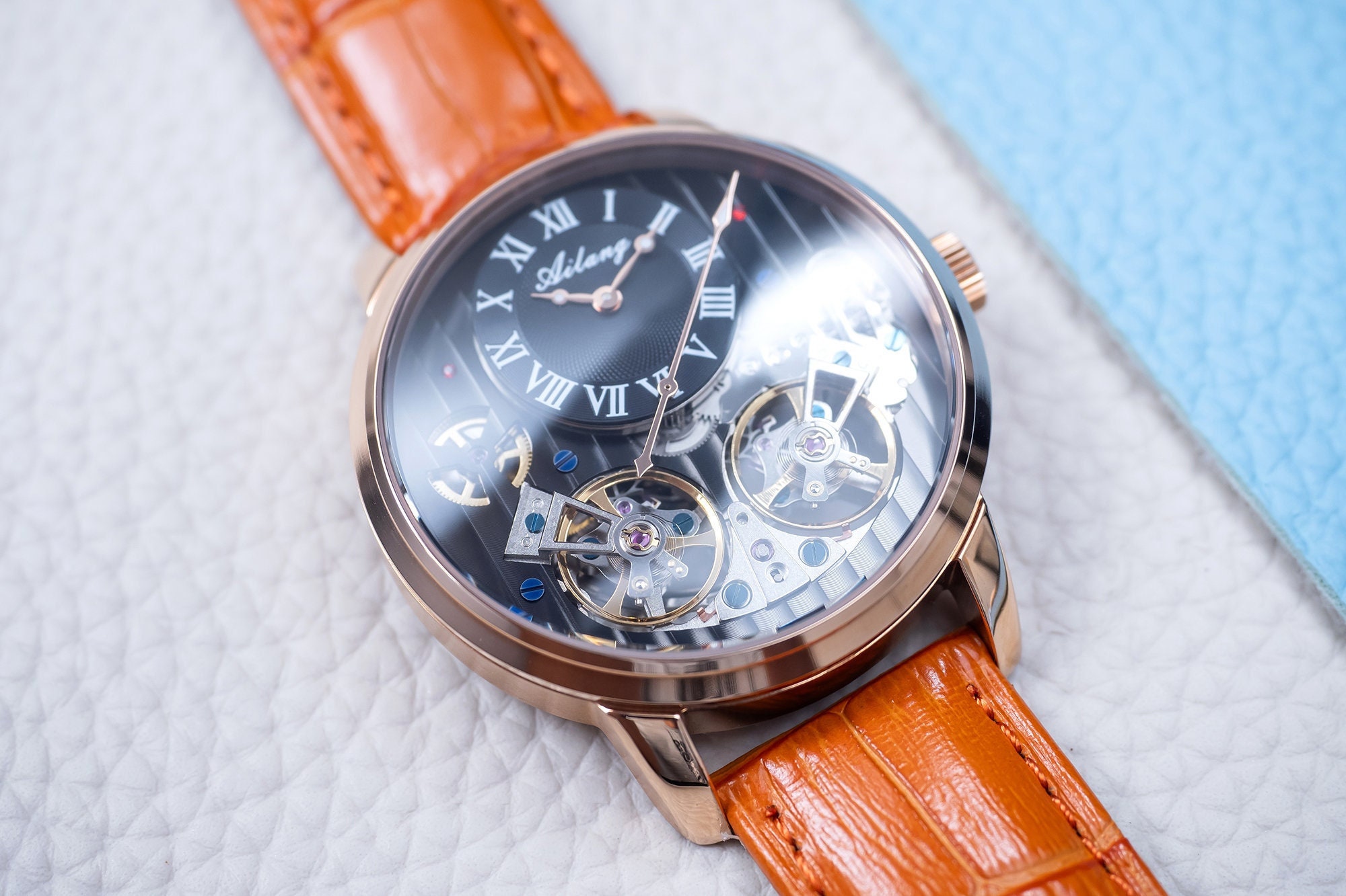 ゴールド文字盤 手巻き時計 ブラックレザー 刻印入り自動巻き腕時計：ローズゴールド、ブラック文字盤、オレンジ