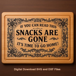 May include: Wooden cutting board with a carved design and the text "IF YOU CAN READ THIS SNACKS ARE GONE IT'S TIME TO GO HOME!". The board has a rectangular shape with rounded corners and a decorative floral border.