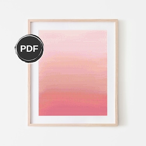 Puede incluir: Una impresión de arte digital enmarcada con un patrón degradado rosa, naranja y amarillo. La impresión está en un marco de madera claro.