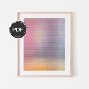 Könnte beinhalten: Ein gerahmter abstrakter Kunstdruck mit einem verschwommenen, farbenfrohen Design. Der Druck zeigt einen Farbverlauf in Rosa-, Lila- und Orangetönen, der einen weichen und ätherischen Effekt erzeugt.