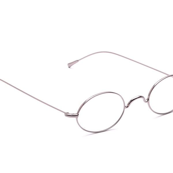 Occhiali ovali argento stile retrò senza pastiglie aste dritte occhiali Schubert donna uomo classico