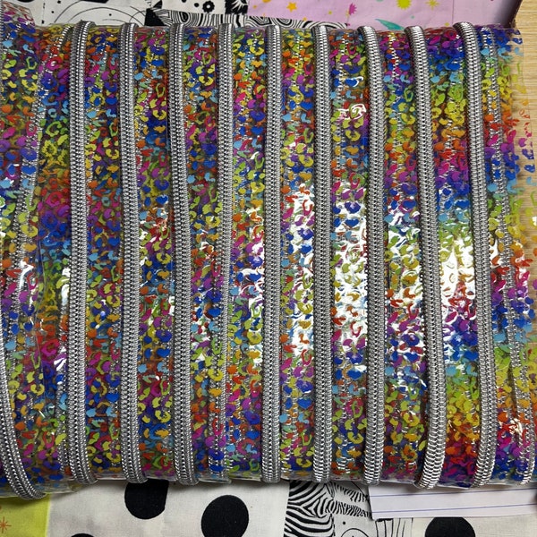 Clear Vinyl Tape with Bright Leopard print with Beautiful Silver Teeth #5 nylon coil BTY easy to cut sew perfect stadium bags Pouches Backpa