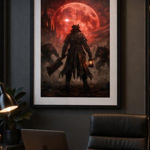 May include: Framed artwork depicting a figure with a weapon and lantern, standing before a large red moon. Dark figures with glowing eyes flank the central character. The artwork is framed in black and hangs on a dark gray wall.