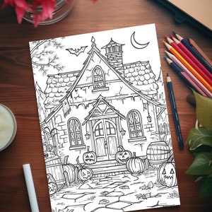 May include: A black and white line drawing of a spooky house with a crescent moon, bats, and pumpkins. The house has a pointed roof, a chimney, and a door with a wreath.
