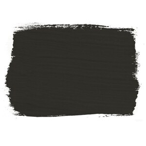 May include: A dark gray paint swatch with a rough, textured surface.