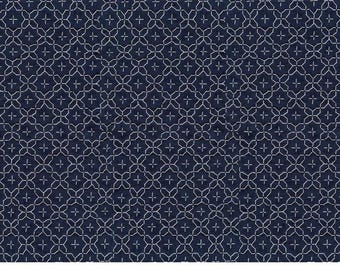 May include: A dark blue fabric with a white geometric pattern of repeating squares and crosses.