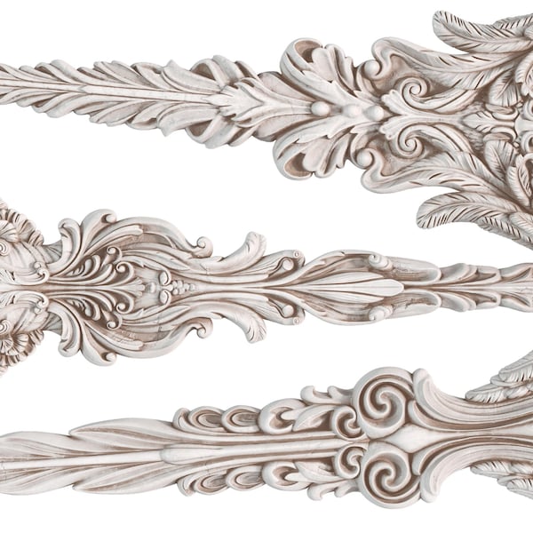 May include: Three white, ornate, decorative wall accents featuring angel figures with wings and floral designs.