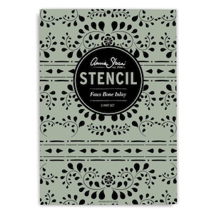 May include: A black and white stencil with a floral design. The stencil is labeled "Annie Sloan Stencil Faux Bone Inlay 3 Part Set".