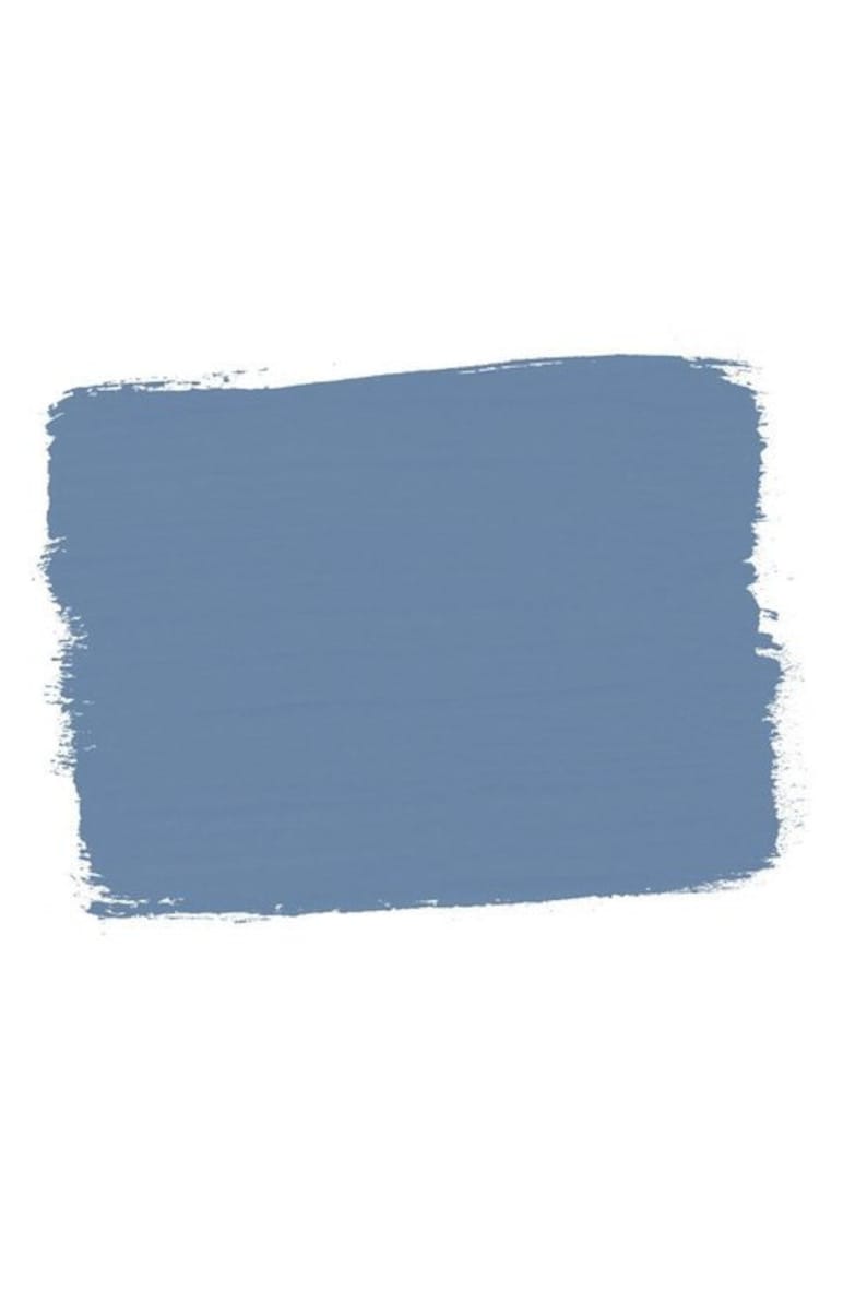 May include: A solid blue paint swatch with a rough, brushstroke texture.