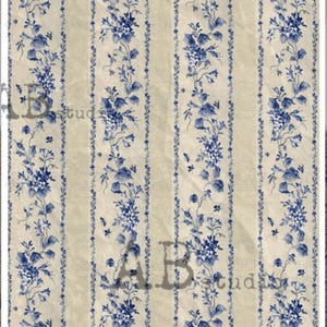 May include: Vintage-style wallpaper with a cream background and vertical stripes. The stripes are interspersed with blue floral patterns, featuring clusters of flowers and trailing vines. The text "AB studio" is visible in the image.