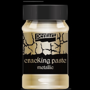 May include: A gold metallic cracking paste in a glass jar with a black lid and label. The label says "pentart cracking paste metallic".