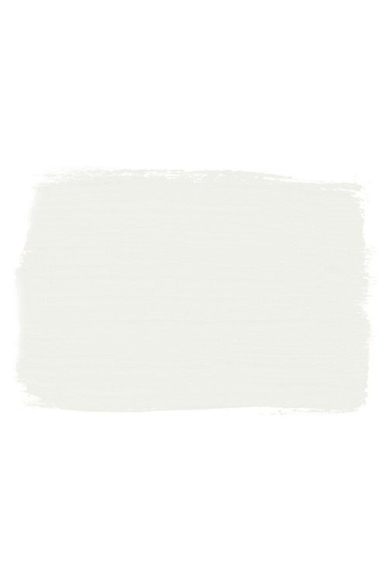May include: A light green paint swatch with a rough, textured edge.