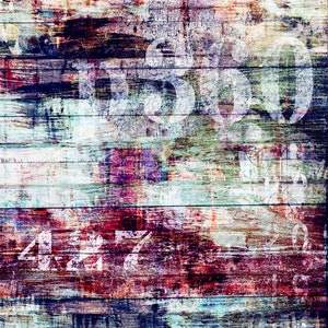 May include: A weathered wooden sign with the words "Ruby Tuesday" painted in red. The sign is covered in layers of paint and has a distressed look. The numbers "4227" are painted in white on the bottom of the sign.