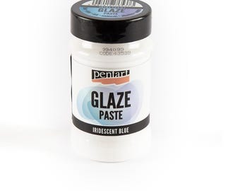 May include: A white jar of iridescent blue glaze paste by Pentart. The jar has a black lid and a label that says "Glaze Paste Iridescent Blue".