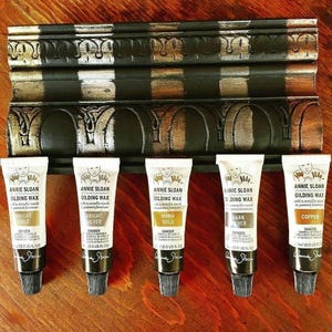 Annie Sloan Gliding Wax in Silver or Copper Rub on wax .