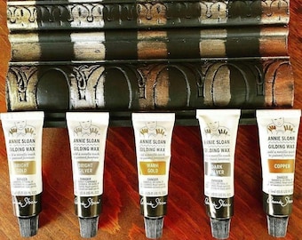 Annie Sloan Gliding Wax in Silver or Copper Rub on wax .
