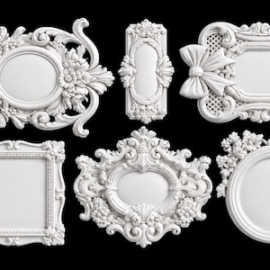 May include: A collection of six white decorative frames featuring intricate relief carvings, including floral motifs, scrollwork, and a prominent bow detail. The set includes various shapes such as rectangular, oval, and elongated rectangular designs.