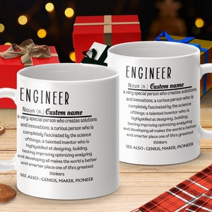 May include: White ceramic coffee mug with a black and white definition of the word "Engineer" printed on it. The definition includes the text "Custom name".