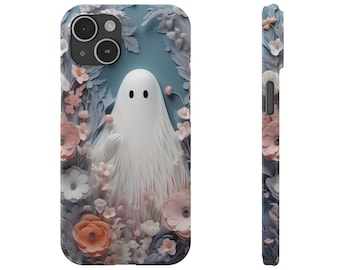 Puede incluir: Un fantasma blanco con una cara amigable está rodeado de flores de papel rosa y azul. El fantasma está sobre un fondo azul. Esta es una funda de teléfono.