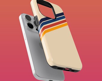 May include: A white iPhone case with a retro-style design featuring colorful stripes in shades of blue, red, and yellow. The case is shown on top of a silver iPhone.