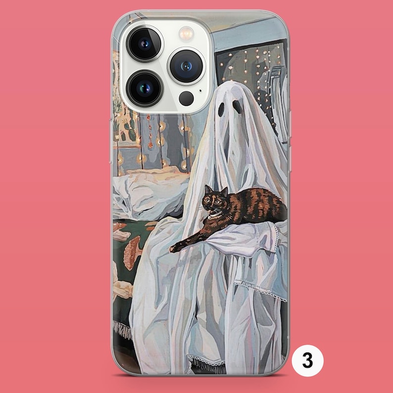 May include: A white ghost with a cat sitting on its lap. The ghost is wearing a white sheet and the cat is black and brown. The background is a bedroom with a bed and a nightstand.