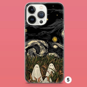 May include: A black iPhone case with a starry night design featuring two white ghosts in a field of grass. The case has a clear back and a white camera bump.