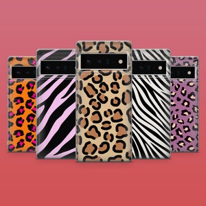 May include: Five different phone cases with animal print designs. The cases are all black and feature different animal prints, including leopard, zebra, and cheetah.