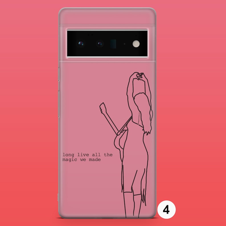 May include: A pink phone case with a black line drawing of a person holding a guitar. The text "long live all the magic we made" is printed on the case.