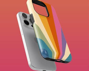 May include: A white iPhone with a colorful rainbow pattern phone case. The case has a black border and a design of colorful stripes radiating out from the center.