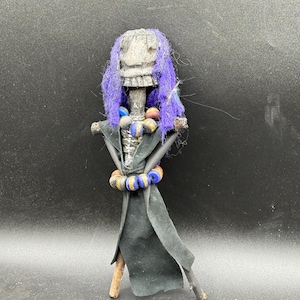 May include: A handcrafted wooden sign reading "Welcome to our home" in a handwritten font. The white-painted sign features black lettering and a distressed finish, suitable for indoor or outdoor display.